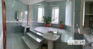 Коттедж 415м², 3-этажный, участок 14 сот.  